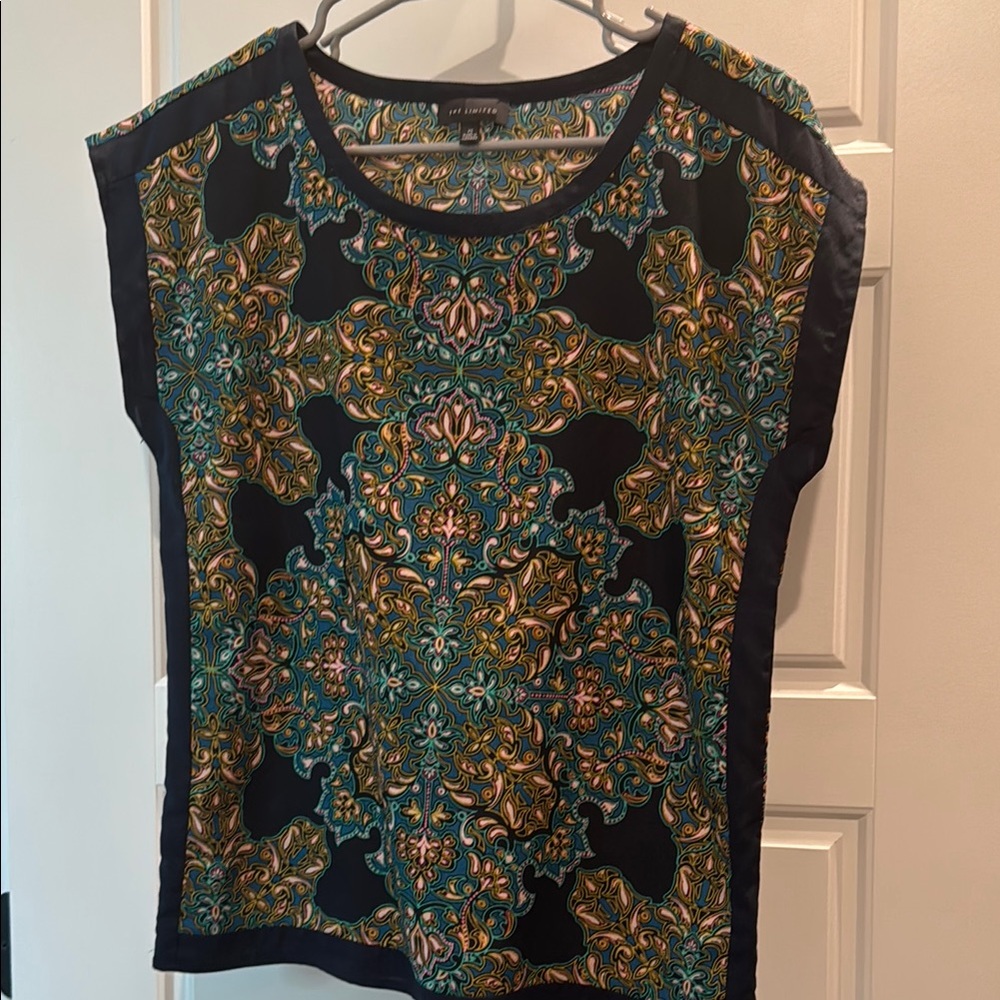 The limited Blue Graphic Boxy Sleeveless Top